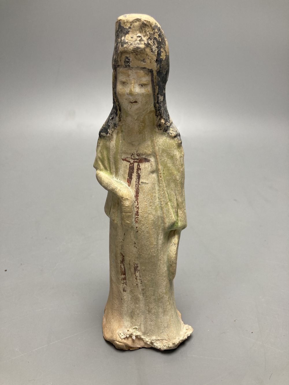 A Chinese part glazed pottery lady, Tang, height 20cm